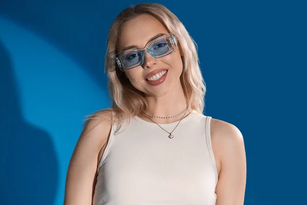 Young Woman Stylish Sunglasses Blue Background Closeup — Stock Photo, Image