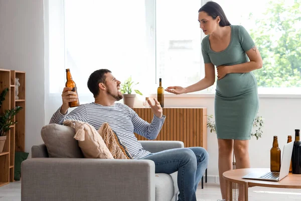 stock image Drunk husband fighting with his pregnant wife at home. Domestic violence concept