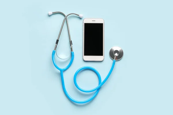 Stethoscope Mobile Phone Light Blue Background — Stock Photo, Image