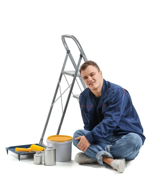 Young Man Ladder Cans Paint Sitting White Background — Stock Fotó