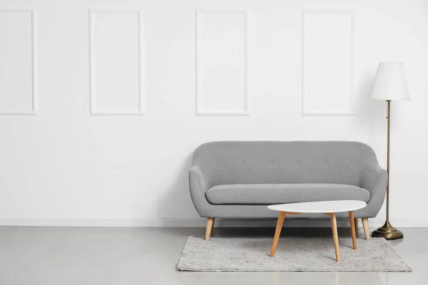 Stylish Grey Sofa Coffee Table Lamp White Wall — Stock Photo, Image