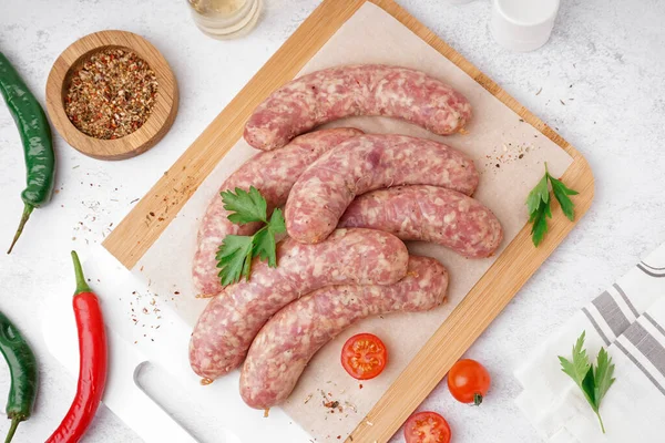 Wooden Board Raw Homemade Sausages Light Background — Stock Photo, Image