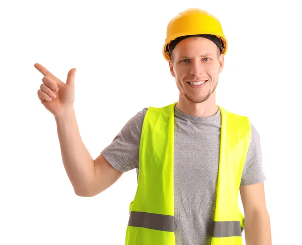 Männlicher Arbeiter Weste Und Hut Zeigt Auf Etwas Auf Weißem — Stockfoto
