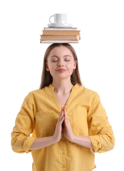 Молодая Женщина Чашкой Книгами Медитирует Белом Фоне Концепция Баланса — стоковое фото