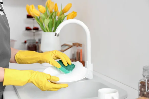 Woman Yellow Rubber Gloves Washing Plate Sponge Light Kitchen — Stock Photo, Image