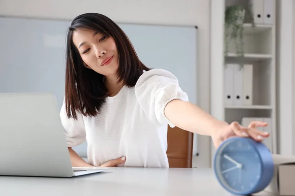 Asian Woman Taking Alarm Clock Office — Stock Photo, Image