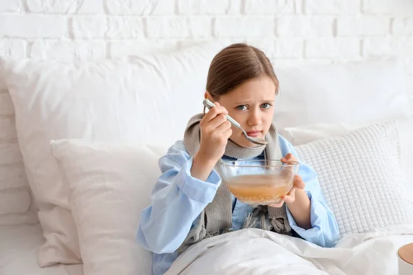 Ill Little Girl Eating Soup Bedroom — Stock Photo, Image