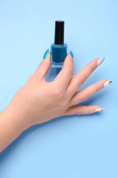 Woman Press Nails Polish Blue Background — Stock Photo, Image
