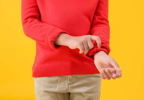 Little Boy Rolling His Sleeve Yellow Background Closeup — Stock Photo, Image
