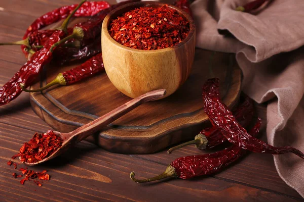 Composition Dry Hot Chili Peppers Spice Brown Wooden Background — Stock Photo, Image