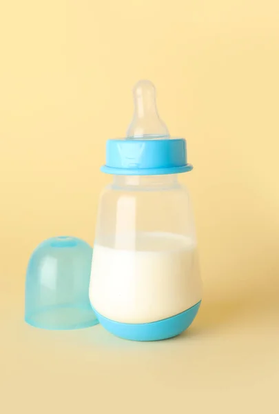 Bottle Milk Baby Pale Yellow Background — Stock Photo, Image