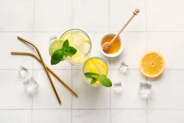 Glasses Infused Water Lemon Honey White Tile Background — Stock Photo, Image