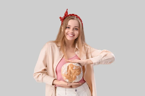 Young Woman Fresh Bread Grey Background — Zdjęcie stockowe