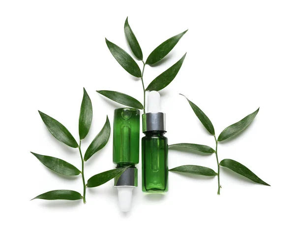 Bottles Cosmetic Oil Plant Twig White Background — Stock Photo, Image