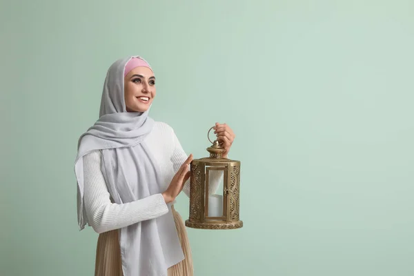 Young Muslim Woman Lantern Green Background Islamic New Year Celebration — Stock Photo, Image