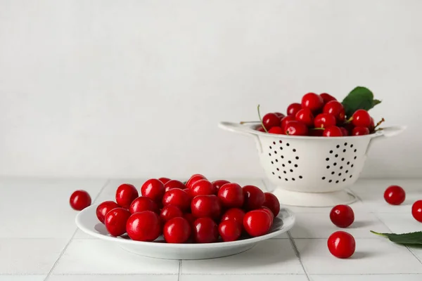 Plate Colander Sweet Cherries White Tile Table — Stock Photo, Image