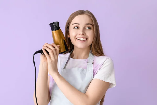 Female Hairdresser Dryer Lilac Background — Stock Photo, Image