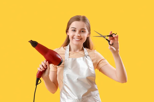 Female Hairdresser Dryer Scissors Yellow Background — Stock Photo, Image