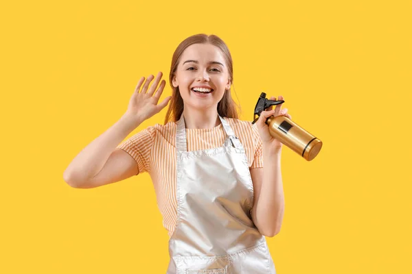 Female Hairdresser Spray Yellow Background — Stock Photo, Image