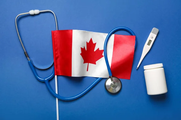 Flag Canada Stethoscope Pill Bottle Thermometer Blue Background — Stock Photo, Image