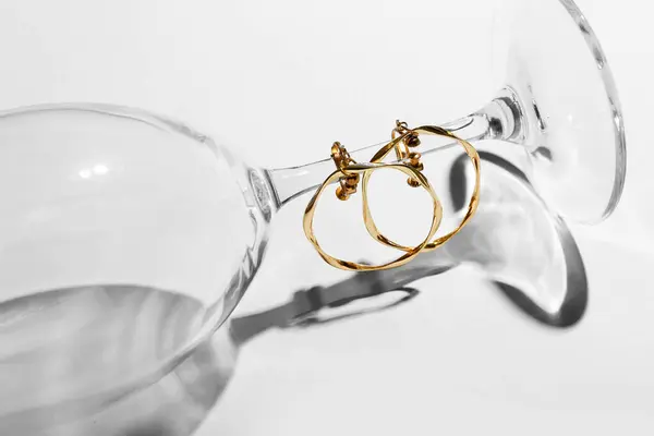 Glass Golden Earrings Light Background Closeup — Stock Photo, Image