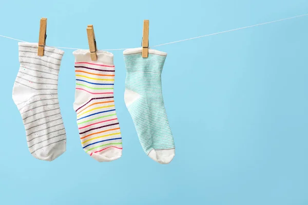 Different Socks Hanging Rope Color Background — Stock Photo, Image