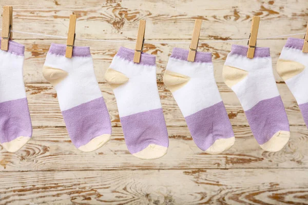 Cotton Socks Hanging Rope Light Wooden Background Closeup — Stock Photo, Image