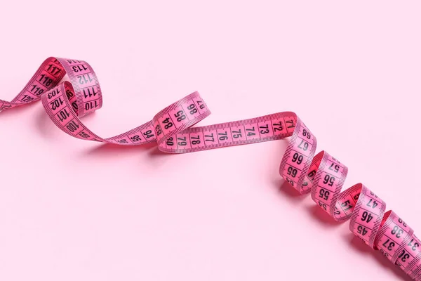 Measuring Tape Pink Background Closeup — Stock Photo, Image