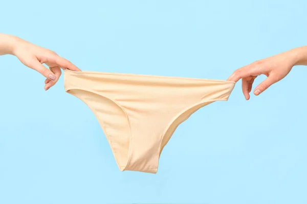 Female Hands Cotton Panties Color Background Closeup — Stock Photo, Image