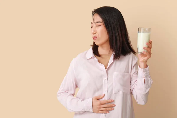 Young Asian Woman Lactose Intolerance Beige Background — Stock Photo, Image