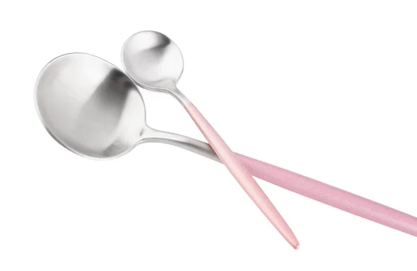白色底座带粉红把手的不锈钢勺子 — 图库照片