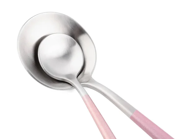 白色底座带粉红把手的不锈钢勺子 — 图库照片