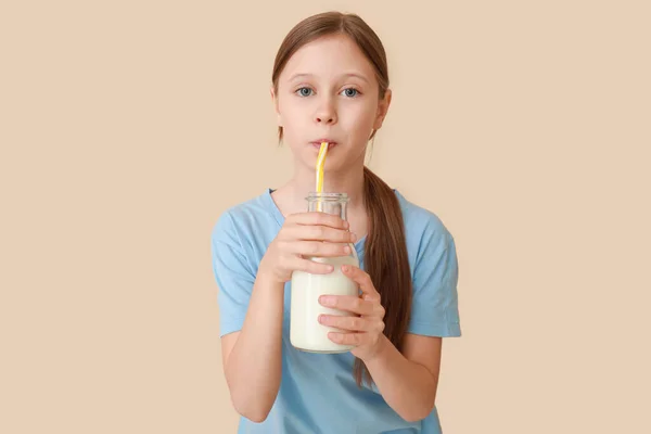 Little Girl Bottle Milk Beige Background — Stock Photo, Image