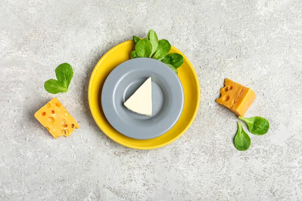 Plates Triangle Tasty Processed Swiss Cheese Grey Background — Stock Photo, Image