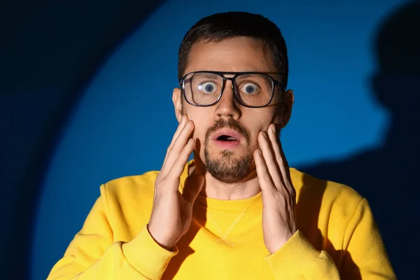 Shocked Young Man Stylish Eyeglasses Dark Blue Background Closeup — Stock Photo, Image