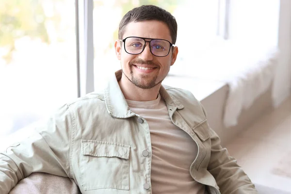 Handsome Man Stylish Eyeglasses Sitting Sofa Home — Stock Photo, Image