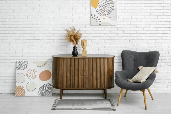 Stylish Interior Living Room Drawers Paintings Armchair Soft Rug — Stock Photo, Image