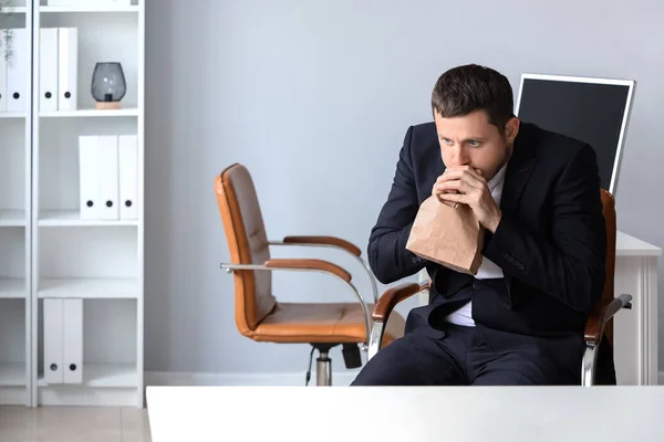 Young Businessman Paper Bag Having Panic Attack Office — Stock Photo, Image