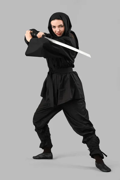 Female Ninja Sword Grey Background — Stock Photo, Image