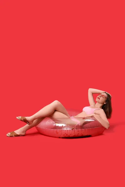 Young Woman Swimsuit Inflatable Ring Red Background — Stock Photo, Image