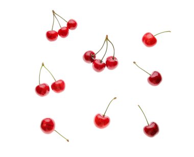 Beyaz arka planda bir sürü tatlı kiraz