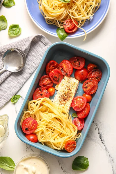Baking Dish Tasty Pasta Tomatoes Feta Cheese White Marble Background — Stock Photo, Image