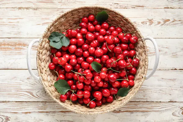 Wicker Basket Sweet Cherries White Wooden Background — Stock Photo, Image