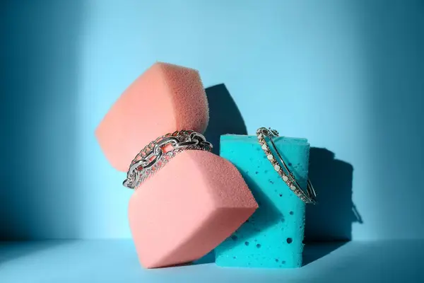 Sponges Jewelry Blue Background — Stock Photo, Image