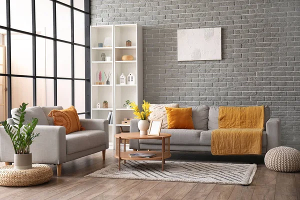 stock image Interior of modern living room with sofas, coffee table and shelving unit