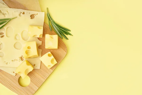 Board Pieces Swiss Cheese Yellow Background — Stock Photo, Image