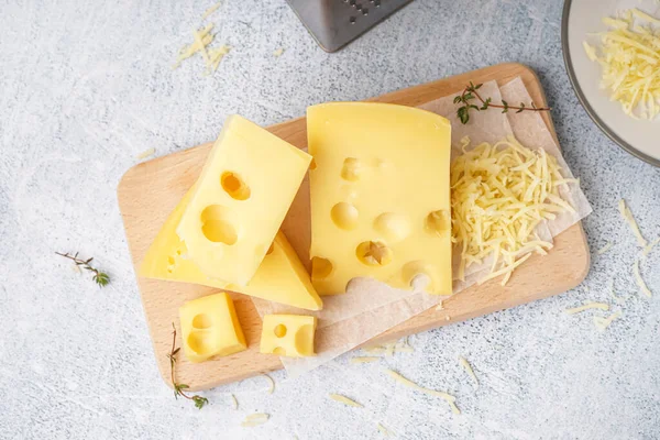 Board Plate Pieces Swiss Cheese White Table — Stock Photo, Image