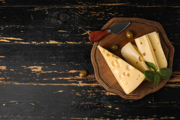 Board Tasty Swiss Cheese Dark Wooden Background — Stock Photo, Image