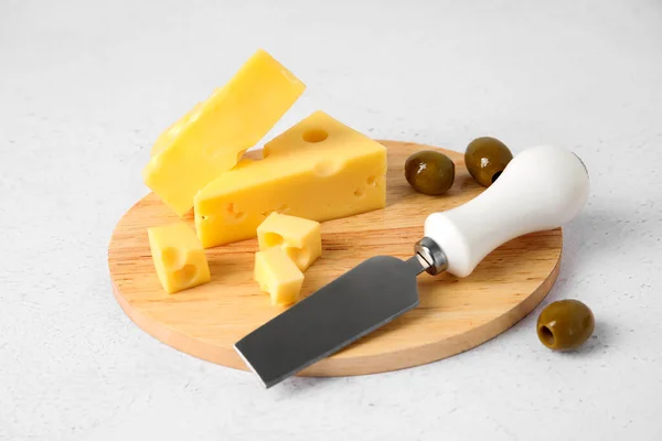 Wooden Board Tasty Swiss Cheese Light Background — Stock Photo, Image