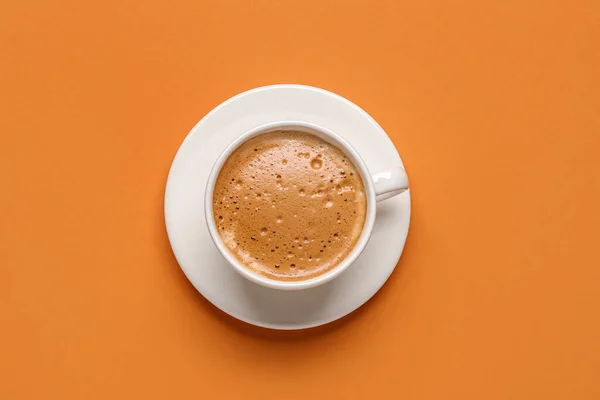 橙色背景的热浓缩咖啡杯 — 图库照片